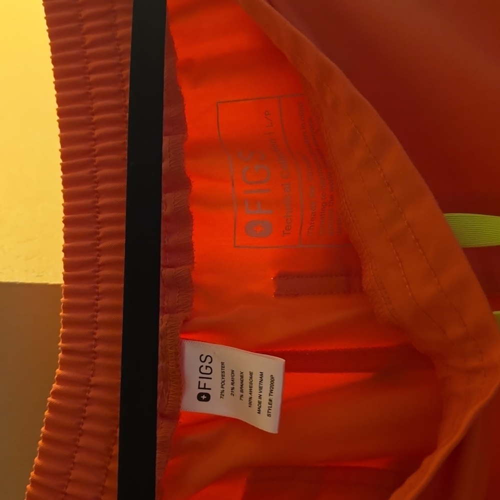 FIGS brand scrub pants in Size Large Petite. Coral color